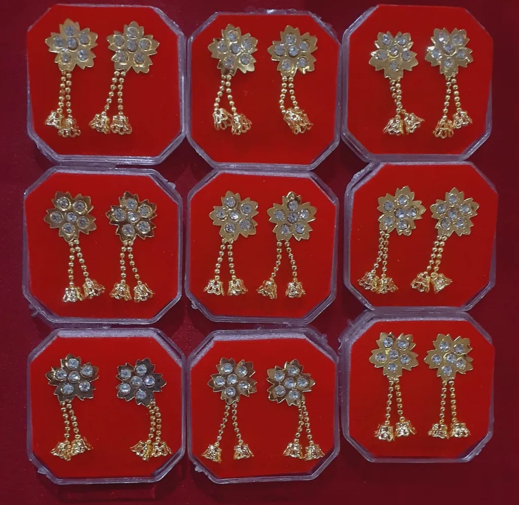 No 107.3 gold plated earrings.webp